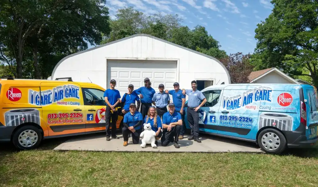 I Care Air Care HVAC installation team working on an outdoor AC condenser in Wesley Chapel, FL