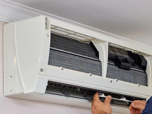 Dirty evaporator coil and clogged filter inside a Tampa Bay air handler, the most common cause of a frozen AC coil