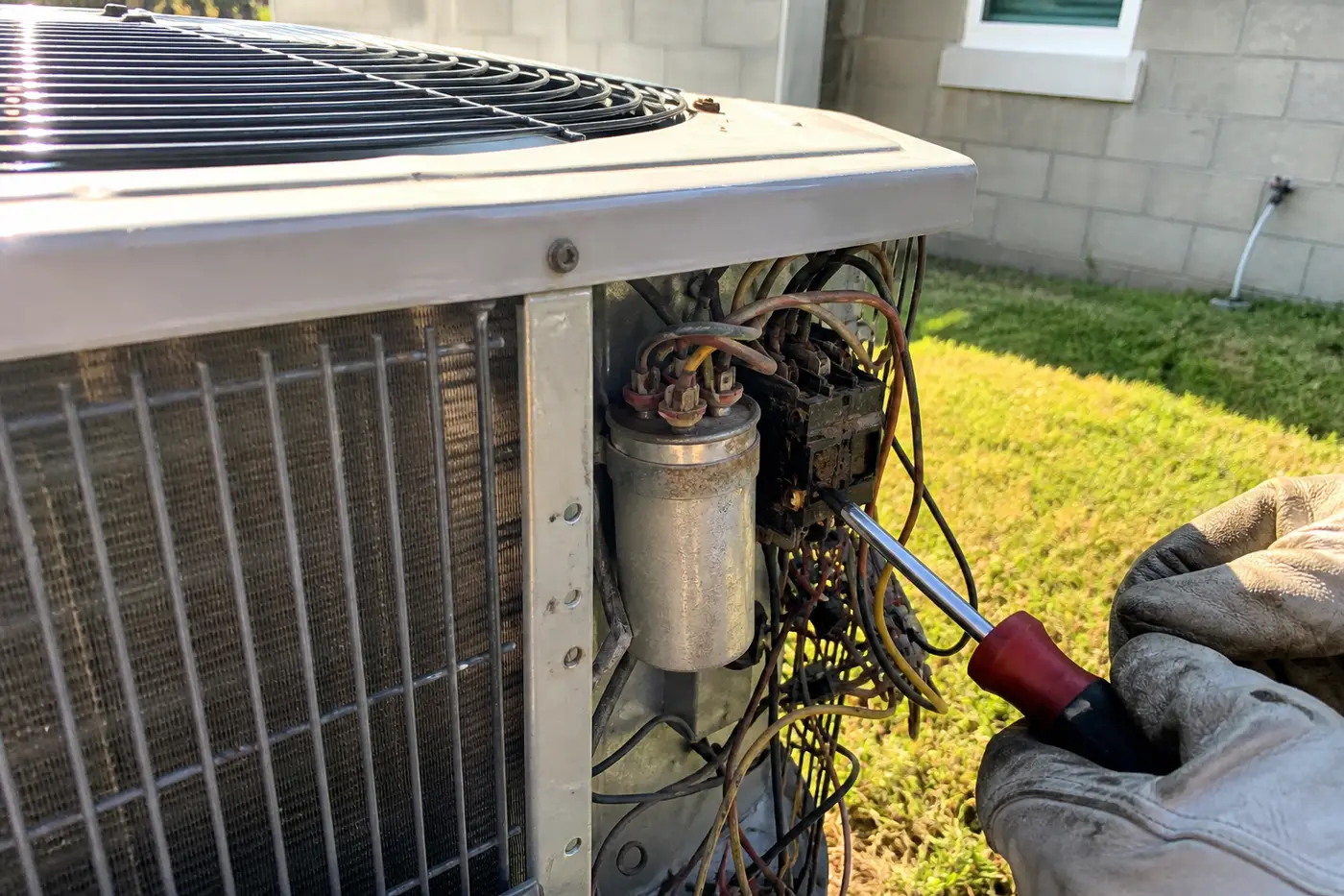 Failed capacitor and contactor inside an outdoor condenser